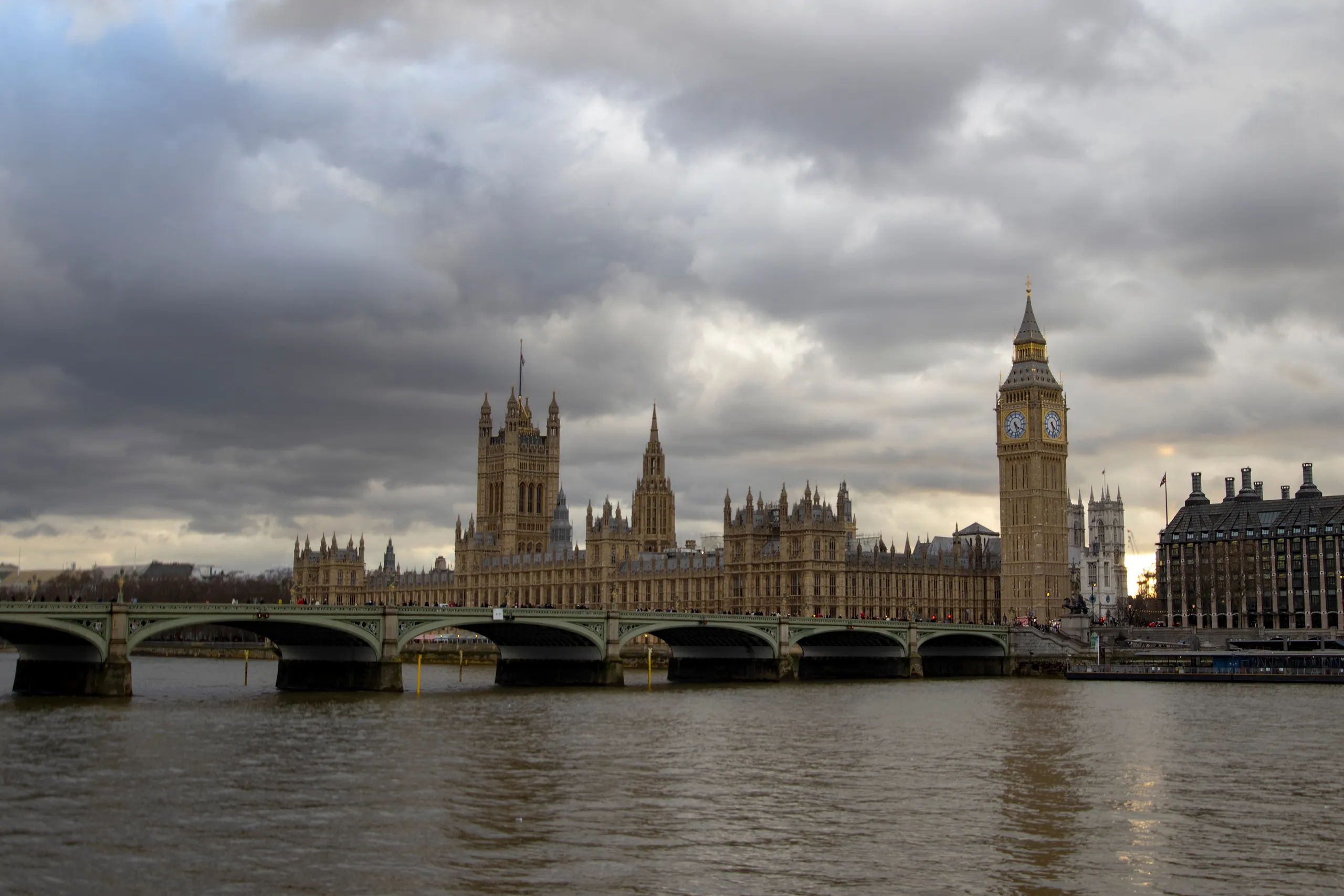 The Palace of Westminster under grey skies, seat of the legislation closing the UK non-dom regime